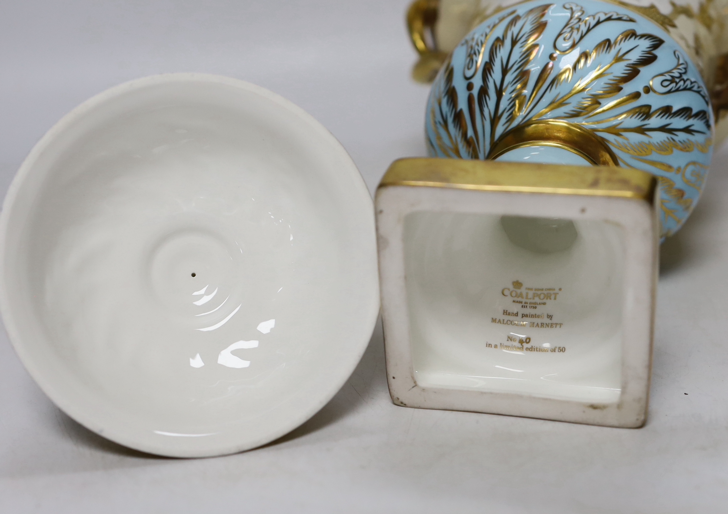 A Coalport boxed presentation urn and cover, signed M Harnett, limited edition of 50, no 40, 32cm high
